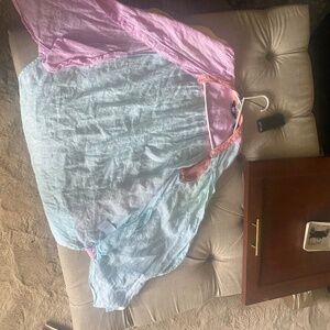 Long sleeved multi colored buttoned down light weight shirt